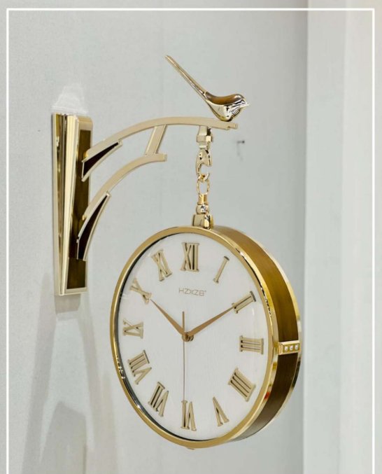 Melting Clock with Bird Design - Wall Clock at Nestern