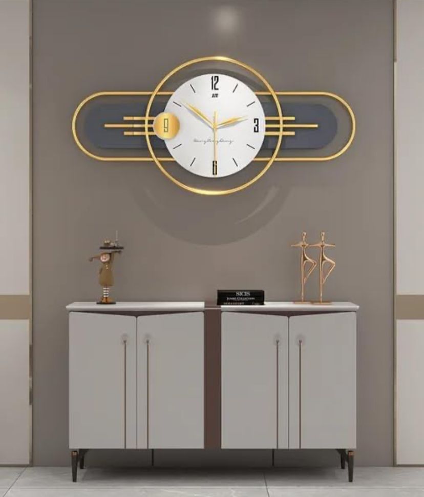 Modern Gold and Black Wall Clock - Sleek Design for Contemporary Interiors - Home Decor at Nestern