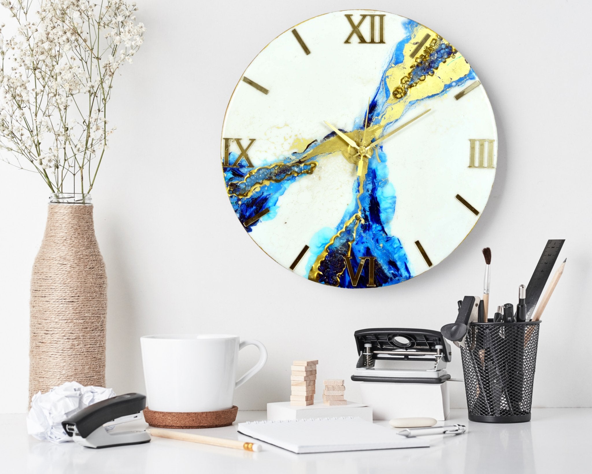 White & Blue Abstract Epoxy Resin Wall Clock, Striking Gold Accents - Wall Clock at Nestern